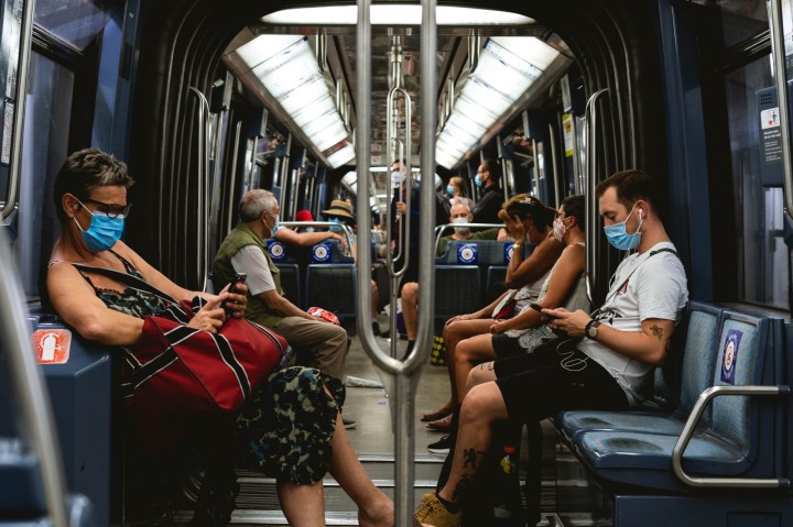 Commuters wearing mask on train. Image: Davyn Ben via Unsplash
